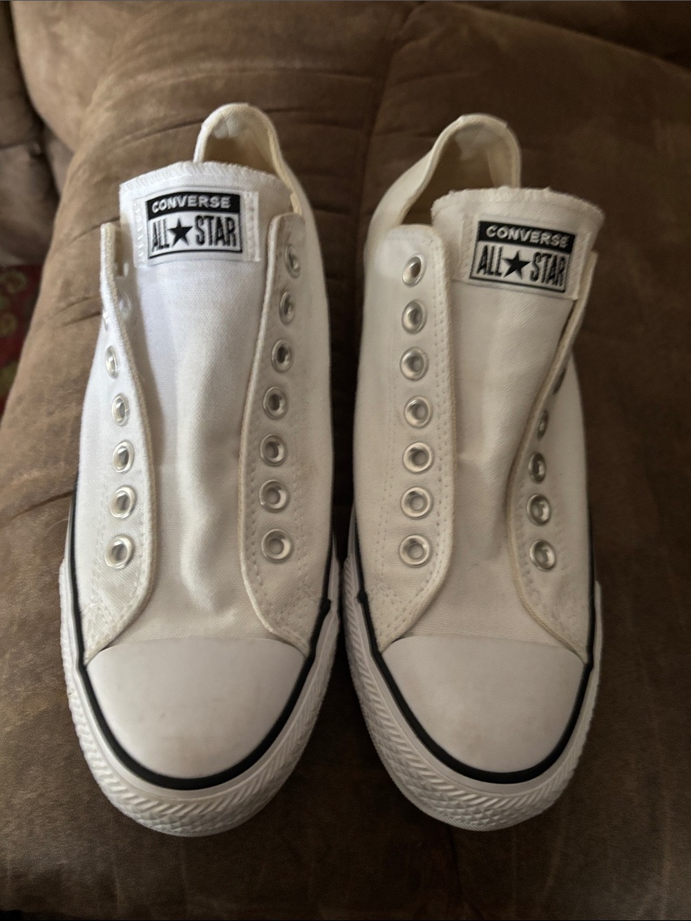 Unisex Converse White Slip-On Canvas Sneakers with Black Trim